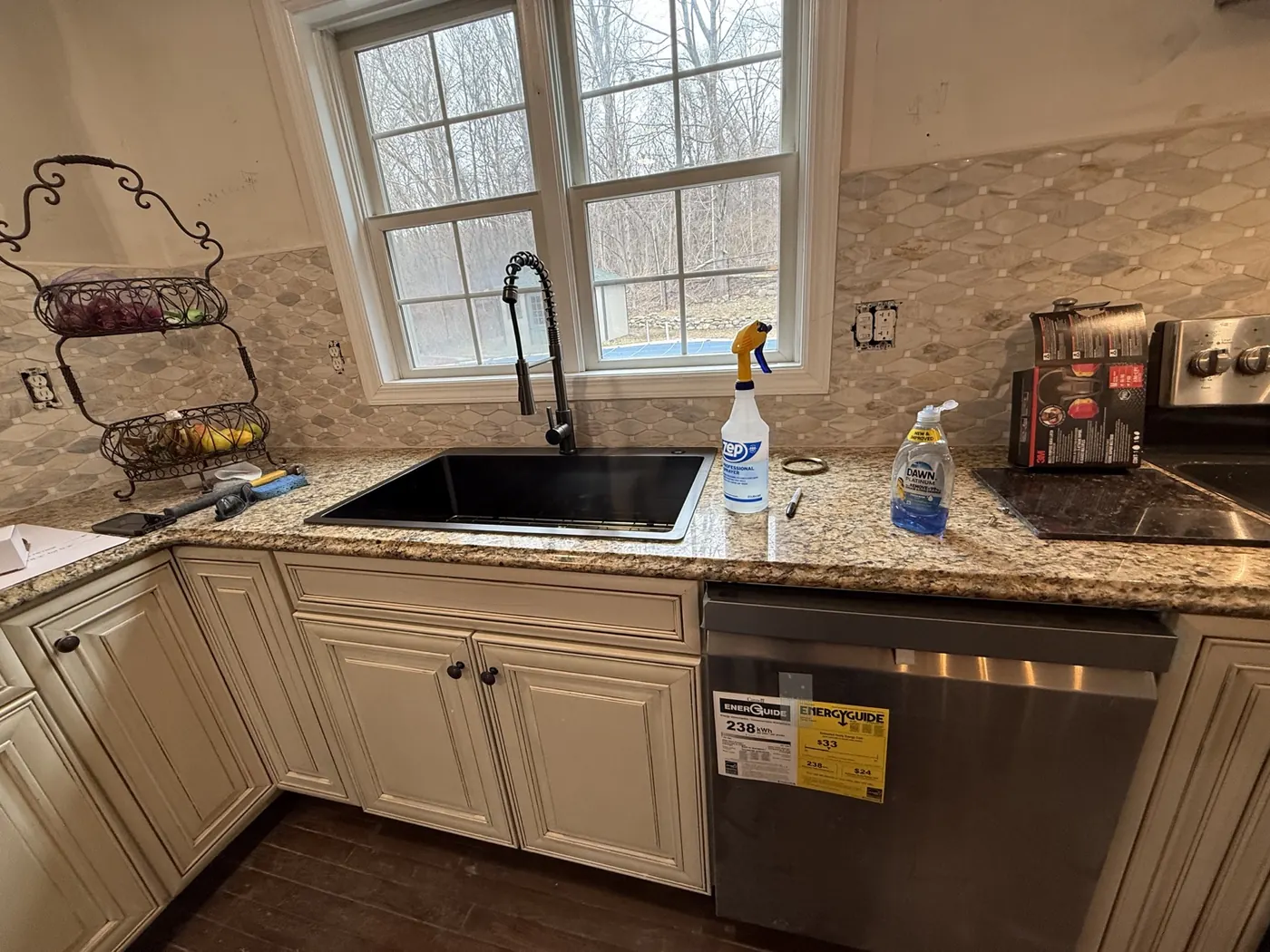 New sink, faucet, backsplash, and dishwasher installation