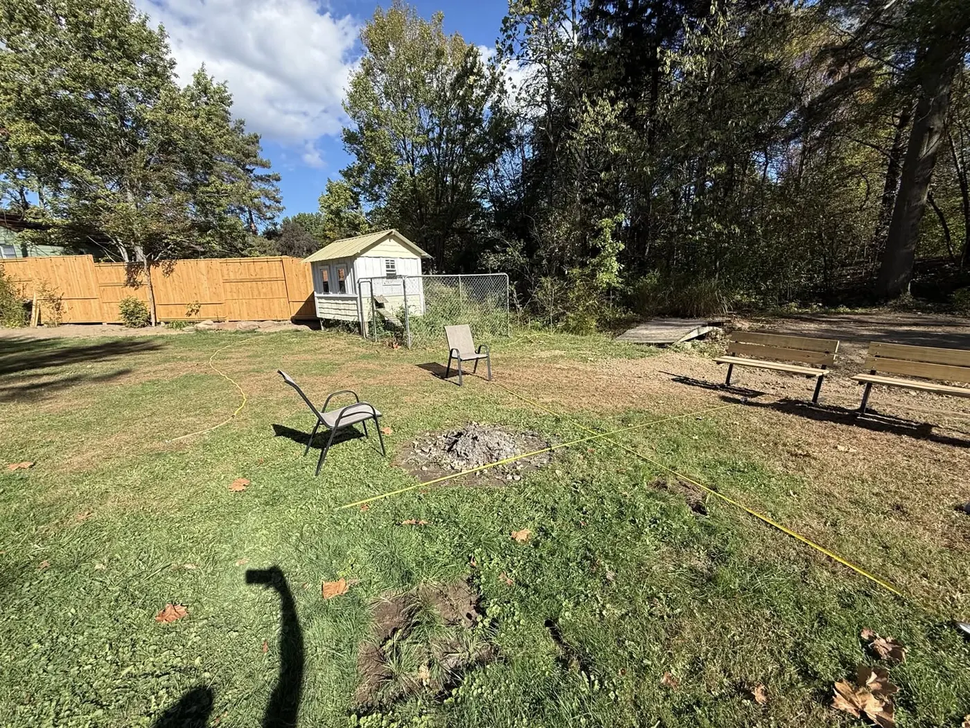 Backyard fire pit area before construction