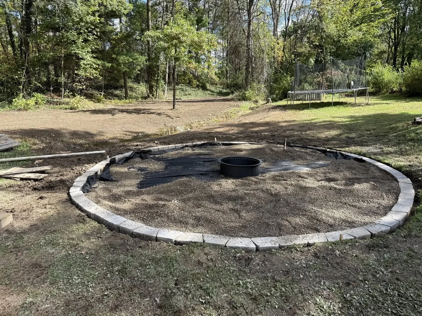 Gravel base and fire ring installation