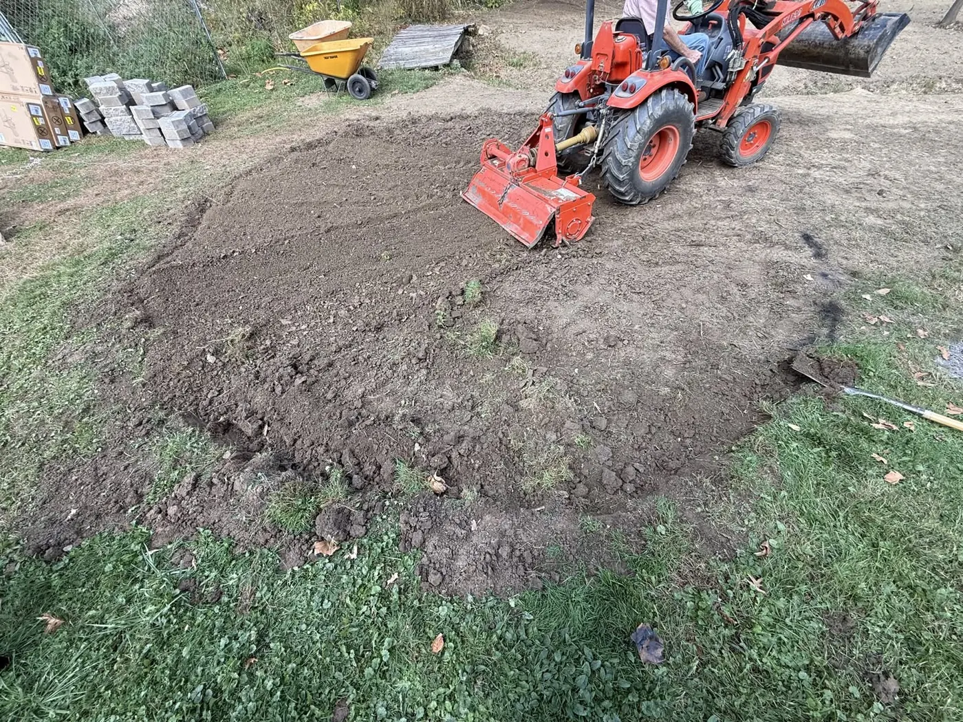 Ground preparation for the fire pit area