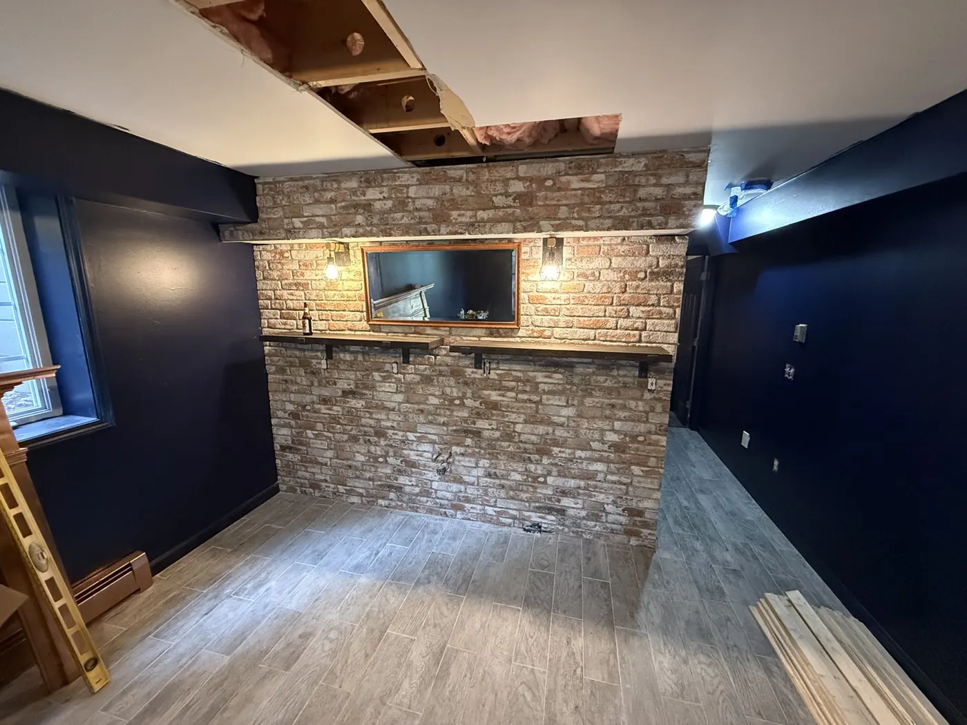 Brick bar wall and new flooring installation