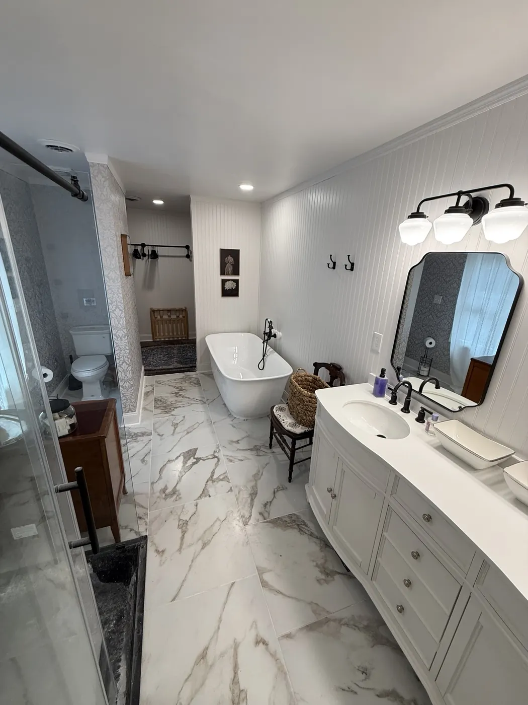 Wide-angle view of the completed master bathroom transformation